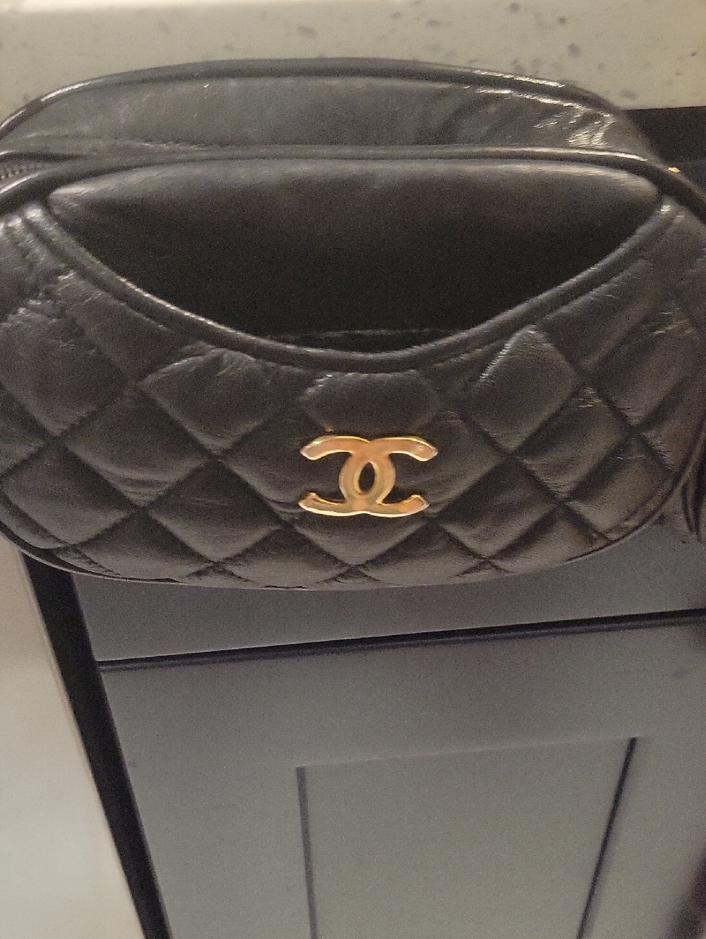 CHANEL Black Quilted Leather Mini Belt Bag with Gold CC